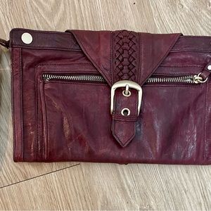 Burgundy leather clutch